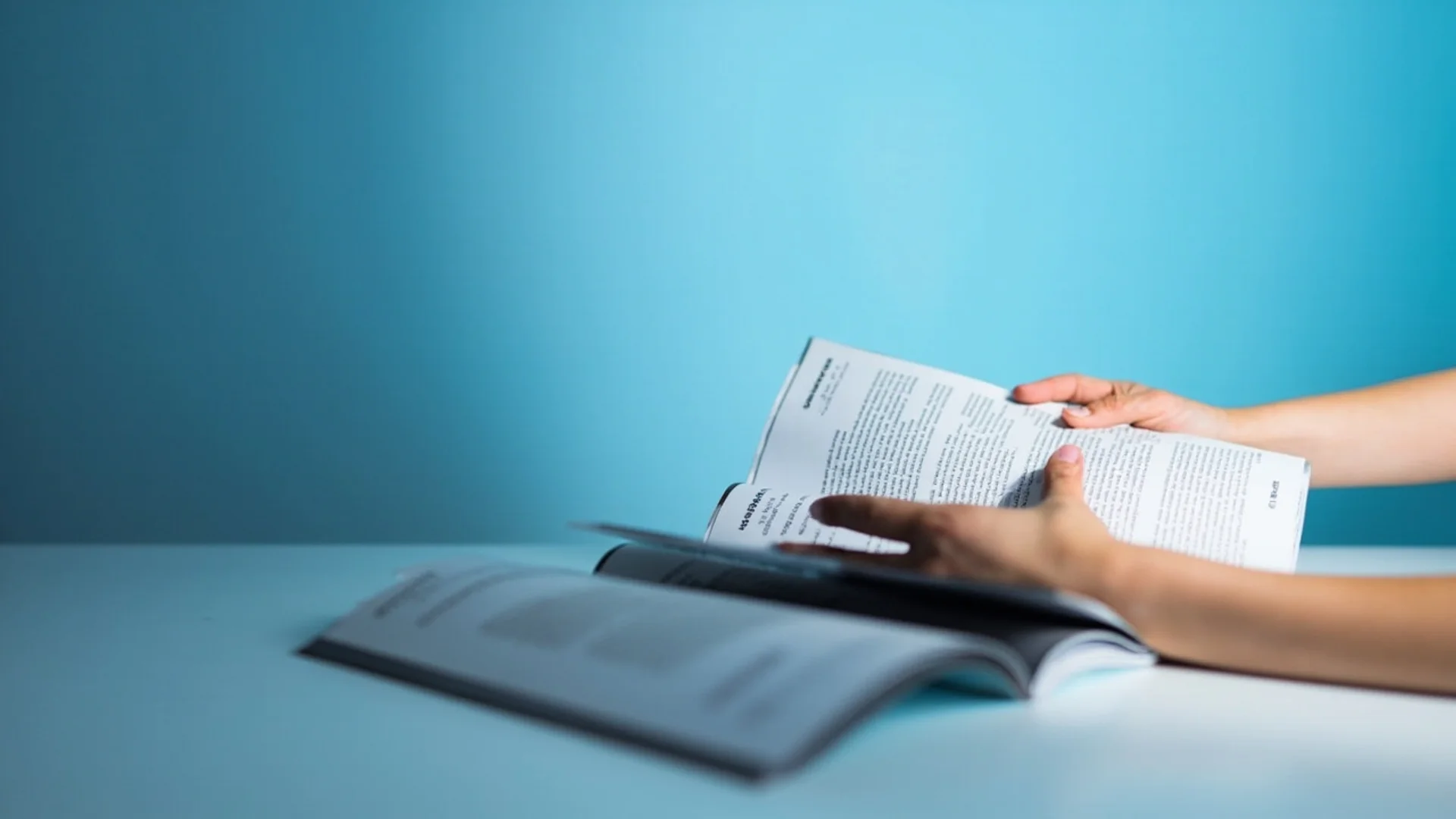 Physical digital sample book with binding and paper texture visible